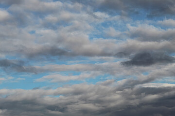 Fototapeta na wymiar Beautiful autumn cloudy sky. Dark gray clouds in the sky