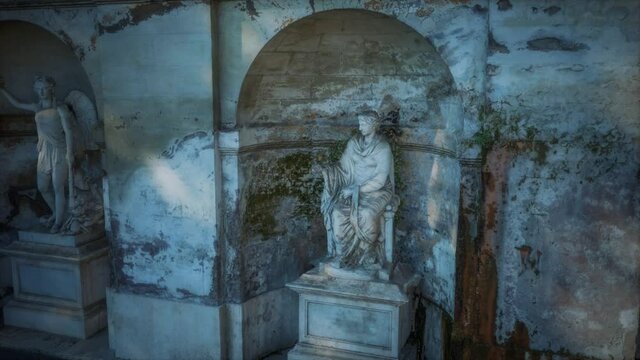 acient roman statues at the stone wall