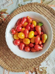 Organic, small coctail tomatoes in a bowl