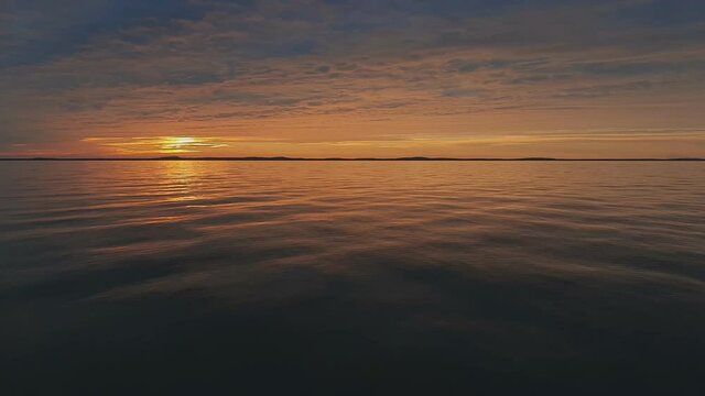 Curonian Spit And Lagoon at Sunset. Two-Thirds of the Frame - Water.