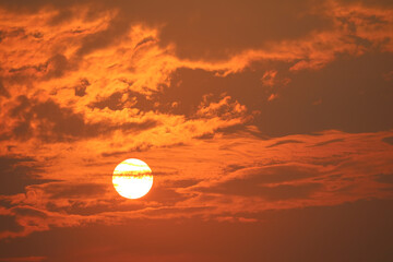 beautiful sunset orange yellow and dark red flame of sky  back on cloud