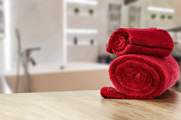 Obraz na płótnie Canvas red towels in bathroom and free space for your decoration 
