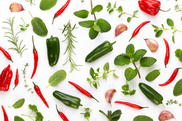 Spice herbal leaves and chili pepper on white background. Vegetables pattern. Floral and vegetables on white background. Top view, flat lay.