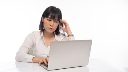 Office lady Working on laptop, stressed posture, working woman concept.