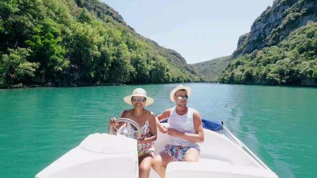 couple in boat Provence, Verdon Gorge at lake of Sainte Croix, Provence, France, near Moustiers SainteMarie, department Alpes de Haute Provence, region Provence Alpes Cote Azur. France Europe