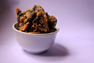 Snacks food, chips of A. auricula-judae Mushroom on a white bowl