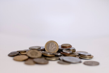 handful of coins from different countries