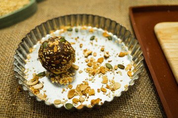 Mixed components inside moon cake, homemade cantonese moon cake pastry on baking tray before baking for traditional festival.