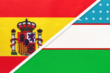 Spain and Uzbekistan, symbol of two national flags from textile. Partnership between European and Asian countries.