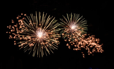 Festive fireworks.Bright rockets in the evening sky