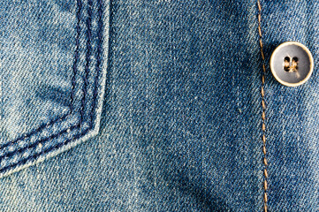clothing items blue stonewashed faded jeans cotton fabric texture with seams, clasps, buttons and...