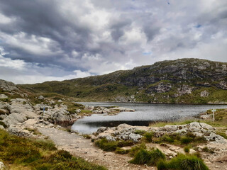 Dark clouds over a mountain lake in Bergen, Norway