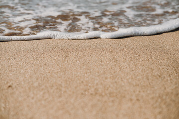 close-up of waves on the beach