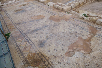 Remains of medieval floor mosaics, a bit damaged from time & weather. It's depicting some kind of eastern type of carpet (or something similar) with geometrical ornaments. Shot in Kizkalesi, Turkey