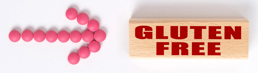 An arrow of pills points to a sign that says GLUTEN FREE