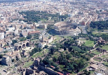 Fototapeta na wymiar aerial view of the Colosseum in Rome with surrounding area in the background