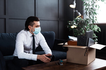 Young man getting fired from his job because of virus pandemic