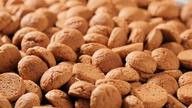 Background for Dutch holiday Sinterklaas with rotation kruidnoten, traditional sweets, strooigoed. St. Nicolas day concept. 4K video, 50 fps