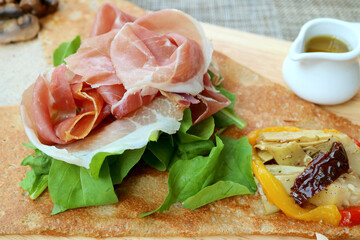 Closeup Cold Cuts Ham with Fresh and Saute Vegetables of an European Appetizer Crepe	