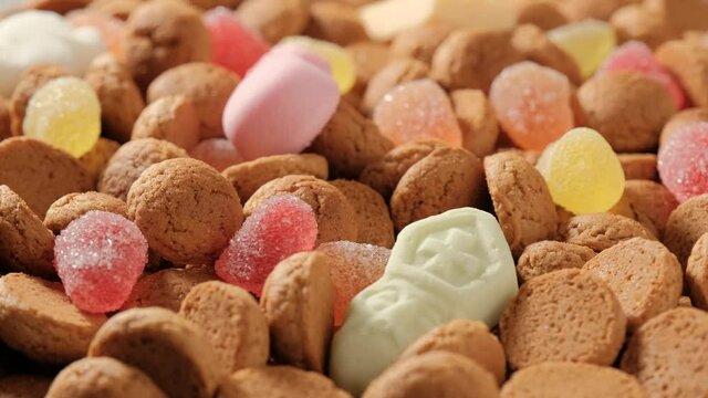 Rotation of kruidnoten, traditional sweets, strooigoed. Background for Dutch holiday Sinterklaas. St. Nicolas day concept. 4K video, 50 fps