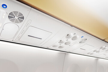 Overhead panel for passengers in an aircraft