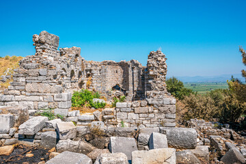Fototapeta na wymiar Priene was an ancient Greek city of Ionia located at the base of an escarpment of Mycale, 6 kilometres north of Maeander River, Güllübahçe, Söke, Turkey