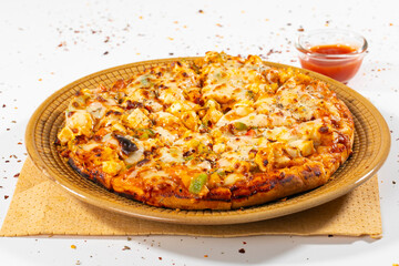 Indian Style of Italian Dish Paneer Pizza Topped with Cottage Cheese on Isolated White Background