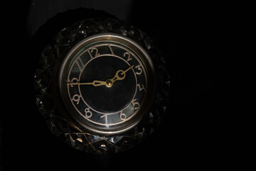vintage clock on a black background