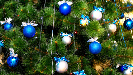 Christmas blue and silver balls on the Christmas tree, Christmas card