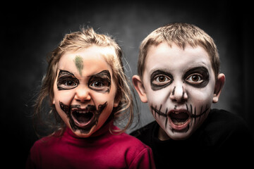 children with face made up for halloween party.