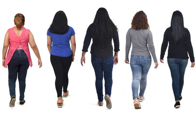 rear view of a group of latin american women walking on white background