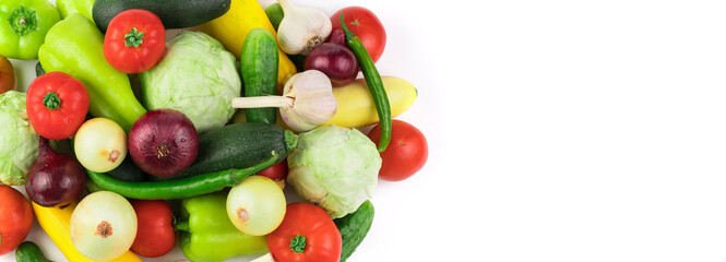 Ripe fresh vegetables in a large assortment on a white background, panorama. Food background. The view from the top. The concept of natural products, proper nutrition.