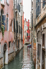 Beautiful view of Traditional Venetian buildings along a water channel, Venice, Italy, Europe.