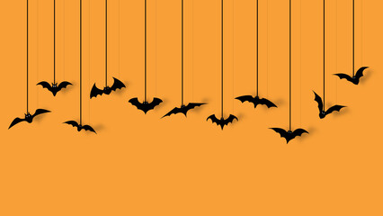 Bat decoration for halloween party isolated on orange background.