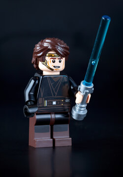 Tambov, Russian Federation - June 21, 2014 Lego Anakin Skywalker Minifigure with lightsaber on black background. Studio shot.