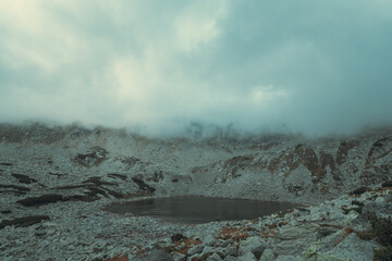 Amazing mountains landscape with glaciar lake in autumn season