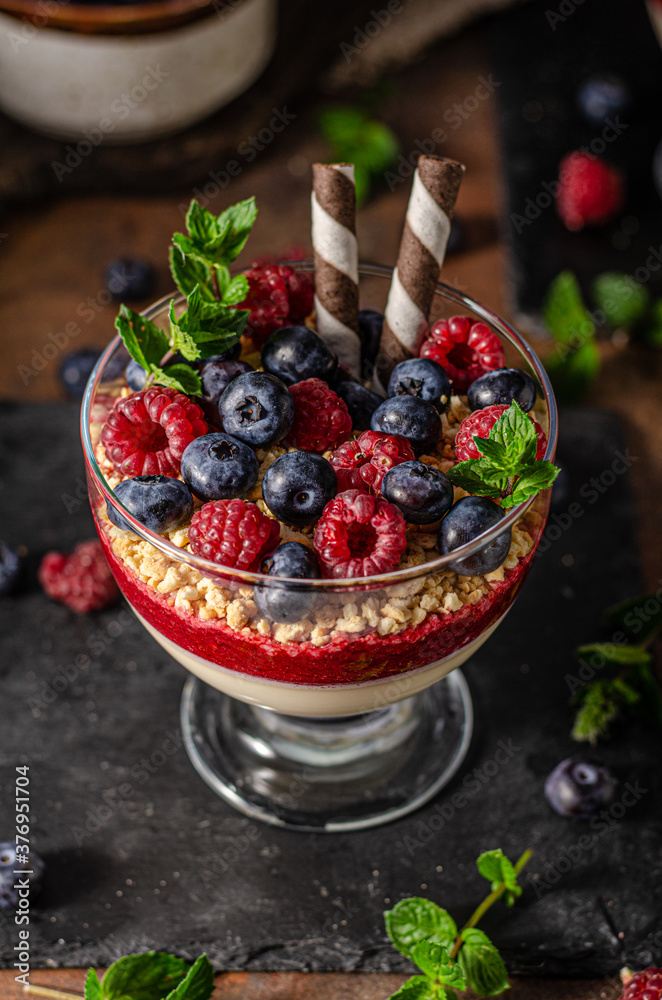 Wall mural fresh panna cotta with forest fruits