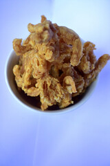 oyster mushroom chips, crunchy, tasty in a white bowl