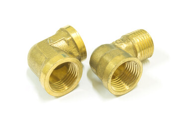 90 Degree brass elbow fitting on white background, Isolated.