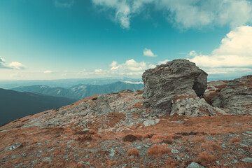 Beautiful mountain landscape in autumn season with yellow grass