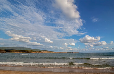 Seascape. Picturesque cloudy sky over a spacious beach on the South Black Sea coast. Ahtopol Resort, Bulgaria.