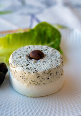 Cheese collection, French soft white goat cheese with herbs of Provence and olives