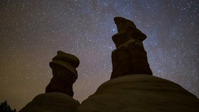  Time lapse of starry sky over hoodoos at Devils Garden in Grand Staircase Escalante National Monument in Utah