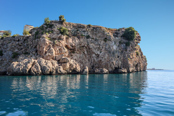 Fototapeta na wymiar rock formations by the sea in Antalya
