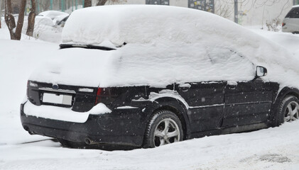 snow covered car