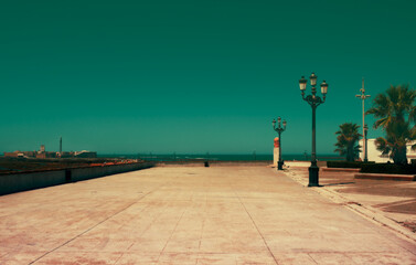 Empty esplanade by the sea