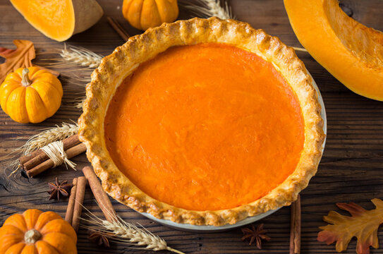Pumpkin pie on the wooden table