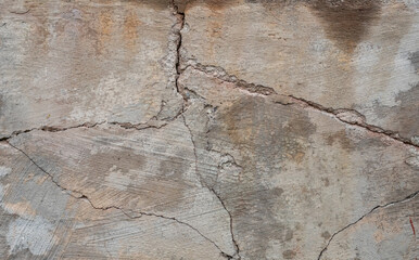 Fototapeta premium Cracked foundations and sidewalks or driveways in need of foundation or driveway concrete repair
