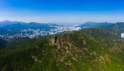 City urban and lion rock mountain from top view
