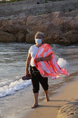 woman in beach on summer sunset
